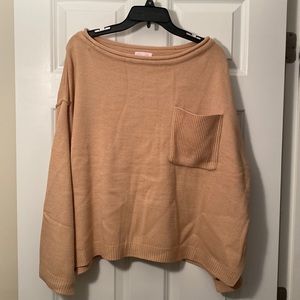 Pink Lilly tan crew neck sweater.